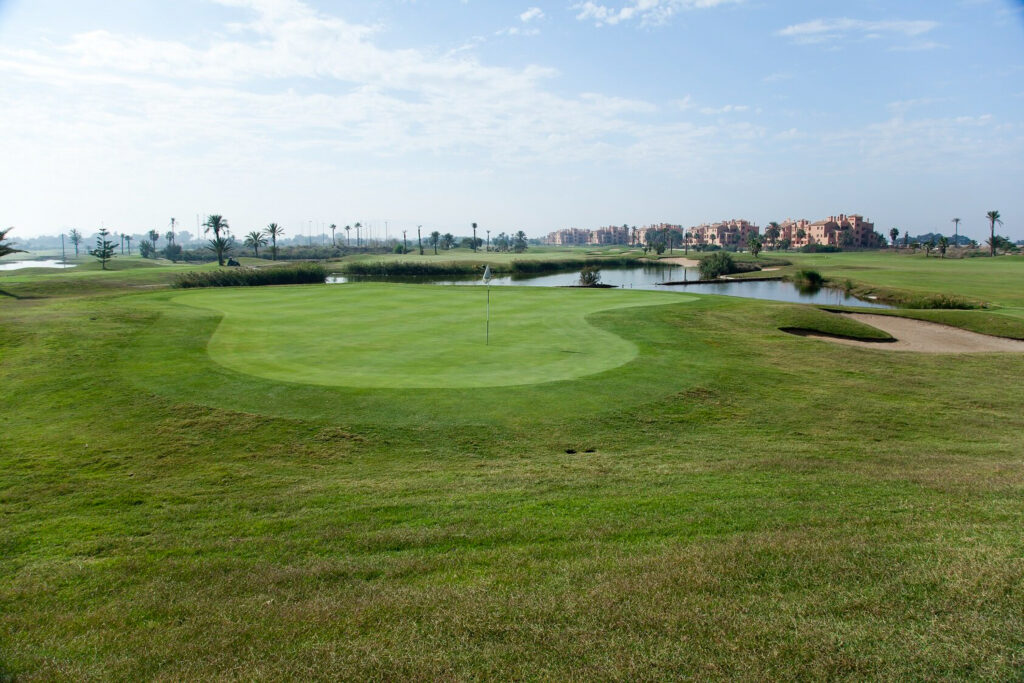 Hole with lake in background at La Serena Golf Course