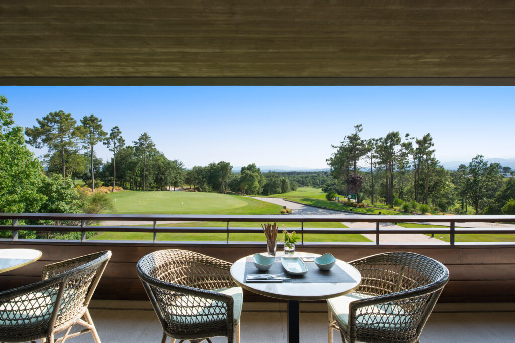 Balcony dining at La Vida Hotel at Camiral Golf & Wellness