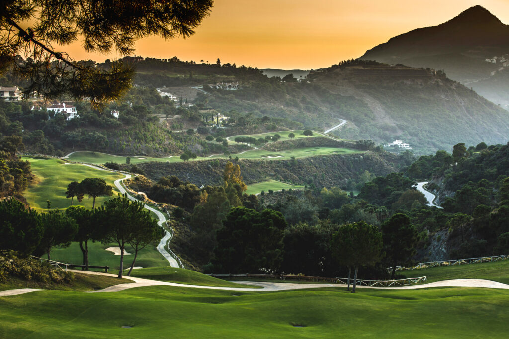 View of the fairway with hillsides and trees at La Zagaleta - New Golf Course