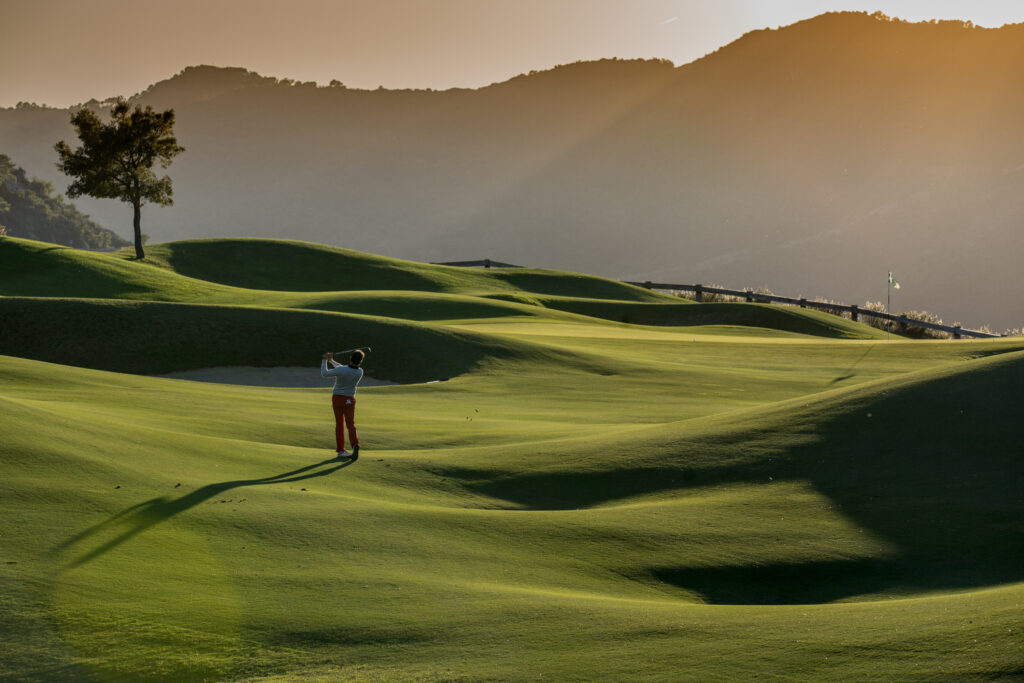 Person playing golf on fairway at La Zagaleta - New Golf Course