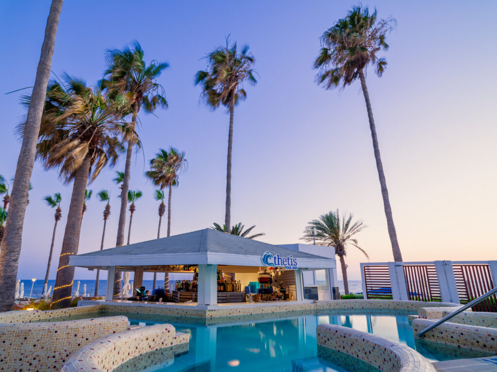 Outdoor poolside bar at Leonardo Plaza Cypria Maris