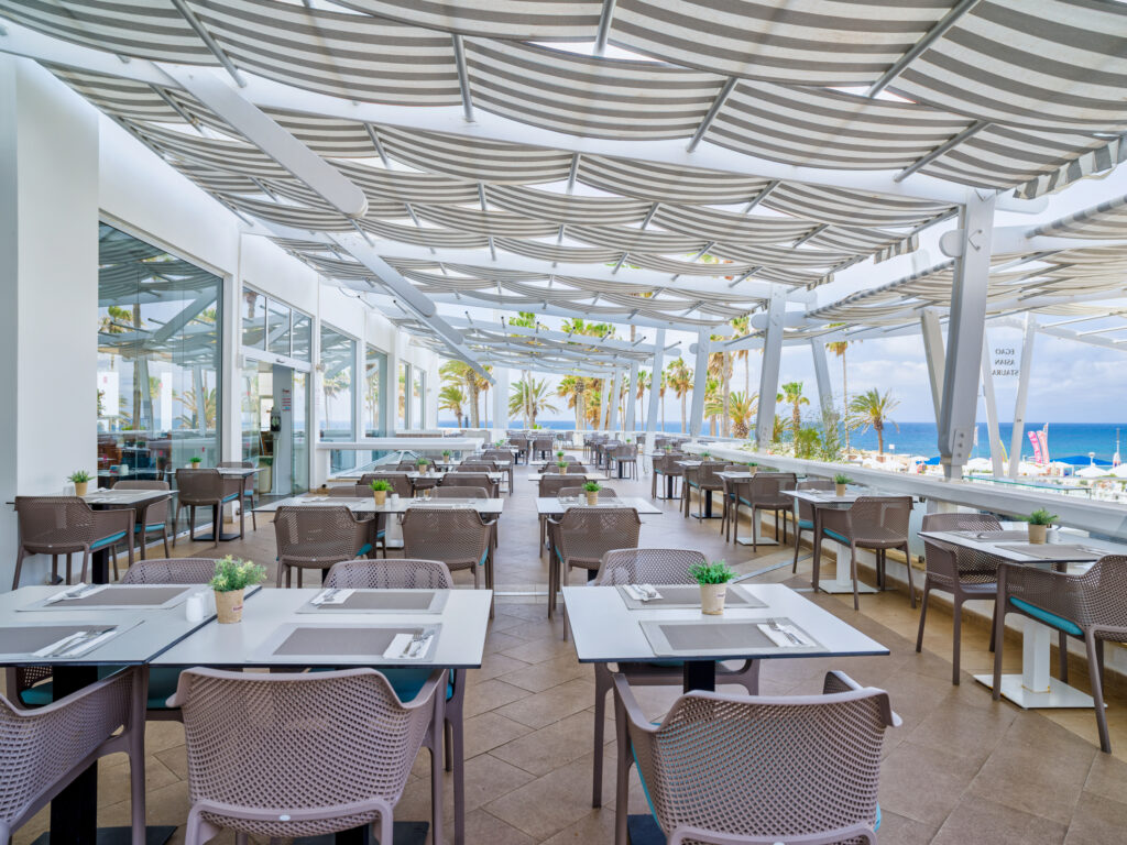 Outdoor dining at Leonardo Plaza Cypria Maris