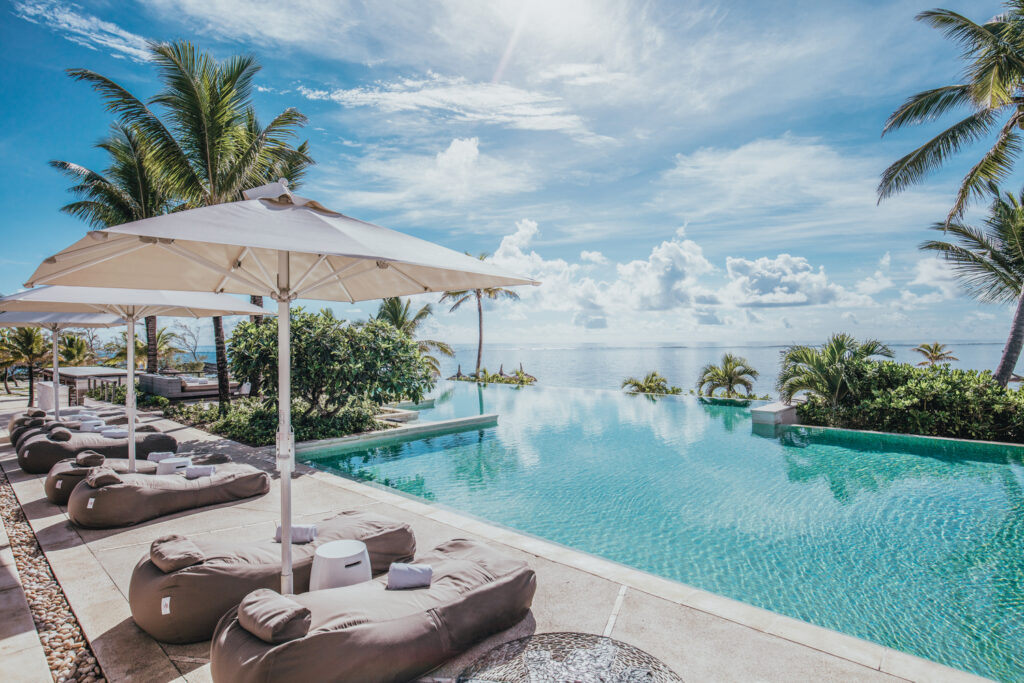 Outdoor pool with sun loungers at Long Beach (Sunlife Resort) with beach view