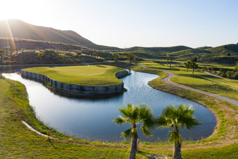 Hole with lake around it at Lorca Golf Course