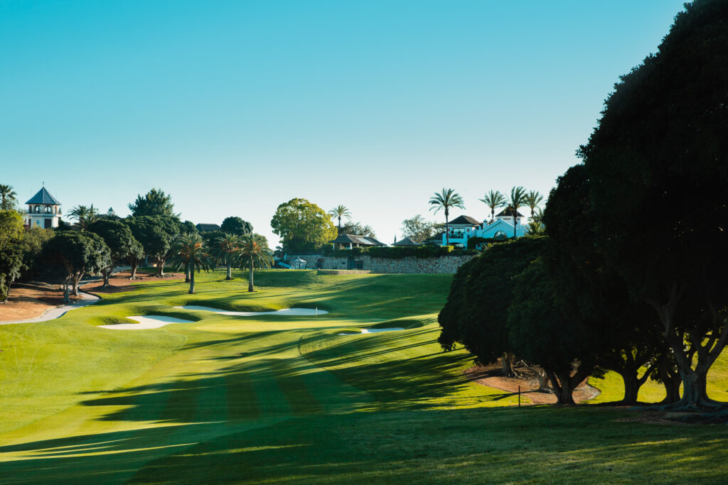 Fairway with bunkers and trees around at Los Naranjos Golf Course