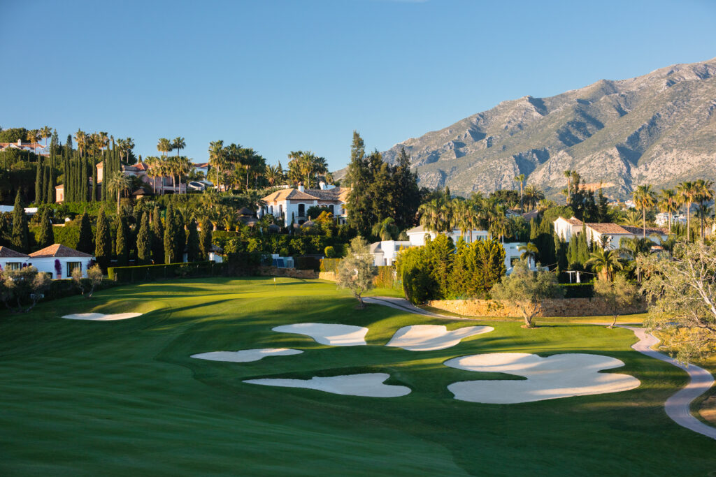 Fairway with bunkers and trees around at Los Naranjos Golf Course