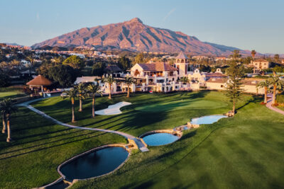 Aerial view of the clubhouse at Los Naranjos Golf Course with a hole with water hazards