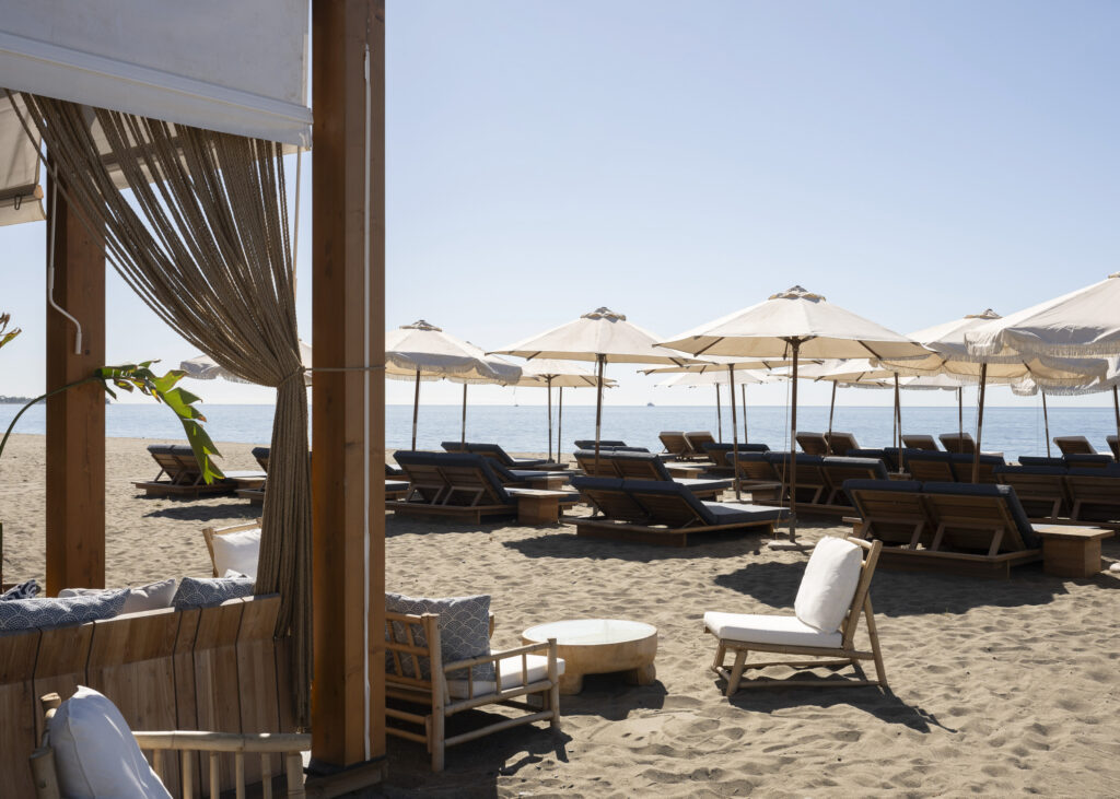 Sun loungers on beach at METT Hotel Beach Resort