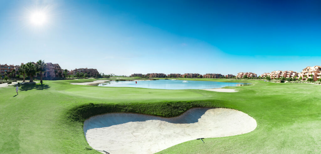 Bunker with hole and lake in background at Mar Menor Golf Course