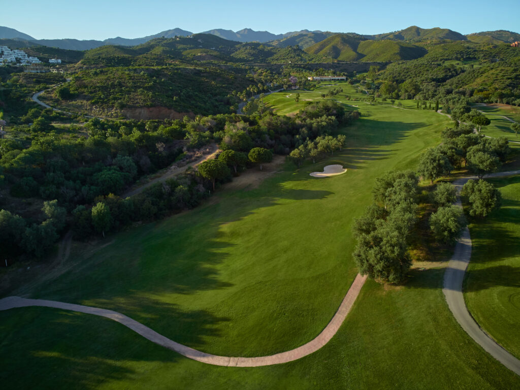 The fairway at Marbella Golf & Country Club with bunkers and trees around