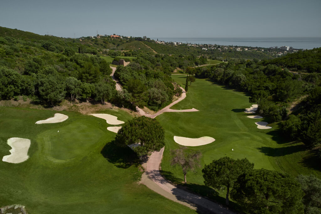 Aerial view of the fairway with bunkers and trees around at Marbella Golf & Country Club