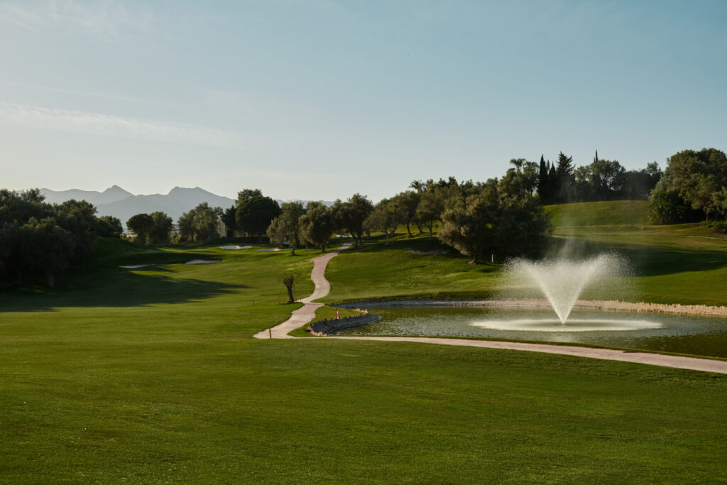 Lake with sprinkler on fairway at Marbella Golf & Country Club