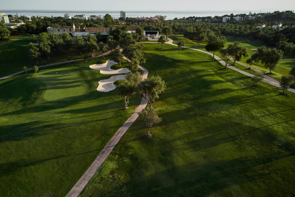 The fairway with bunkers and a hole at Marbella Golf & Country Club