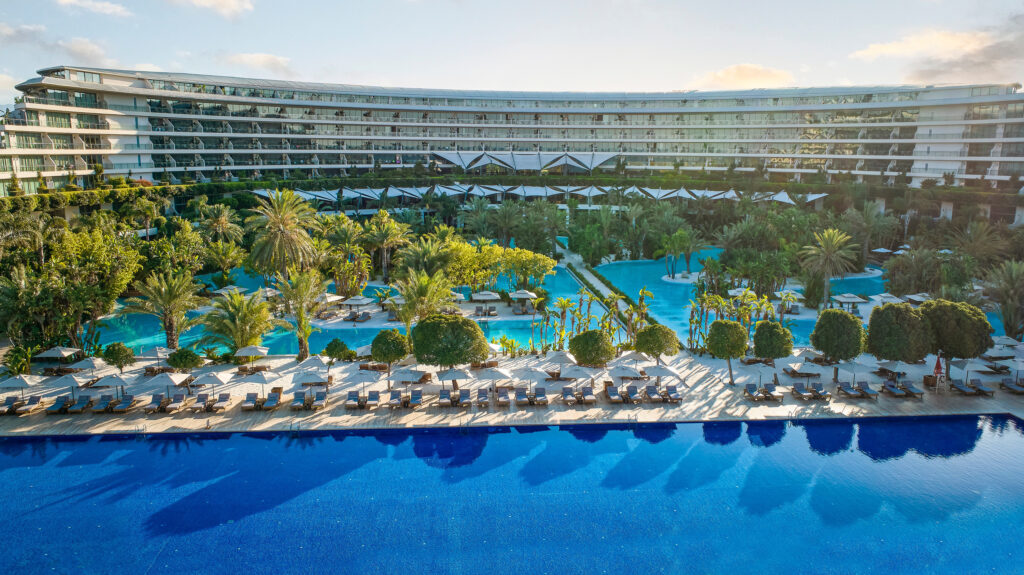 View of outdoor pools and hotel at Maxx Royal Belek Golf Resort