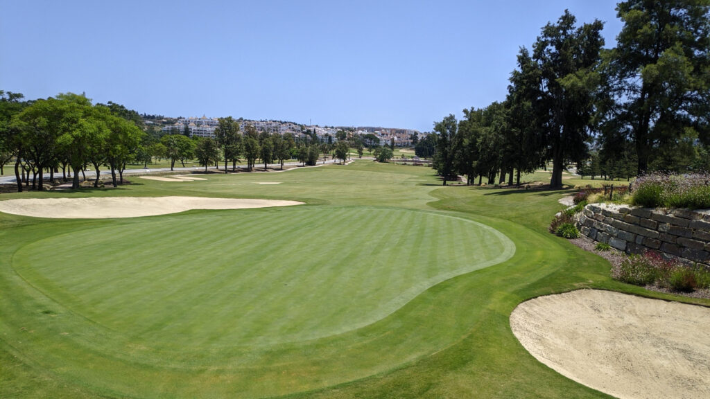 Fairway with bunkers and trees at Mijas Los Lagos Golf Course