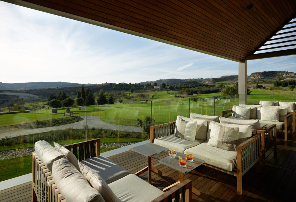 Seating on balcony at Minthis Golf Club