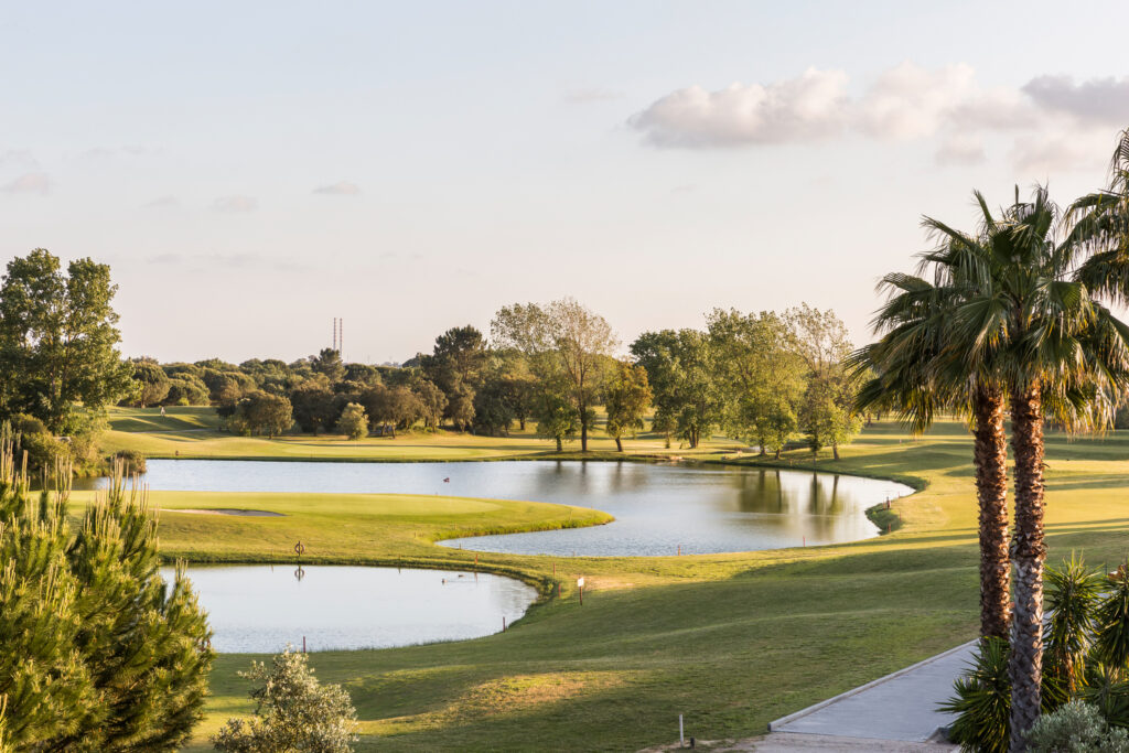 Lake with trees around at Montado Golf Course