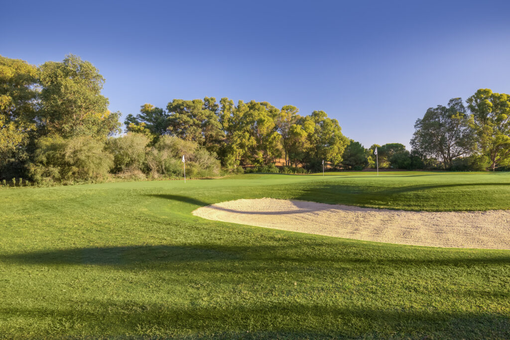 Bunker with trees in the background at Montecastillo Golf Course