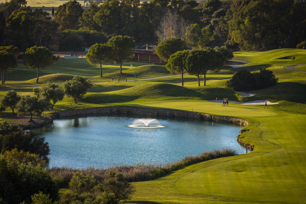 Aerial view of fairway with a lake at Montecastillo Golf Course