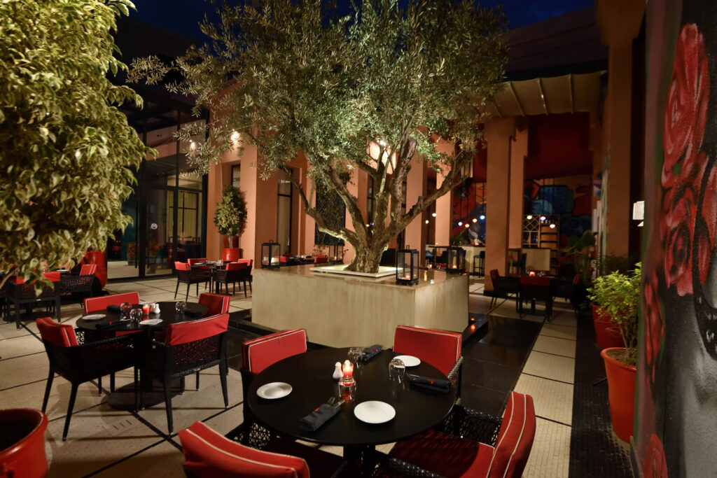 Outdoor dining at Movenpick Hotel Mansour Eddahbi Marrakech