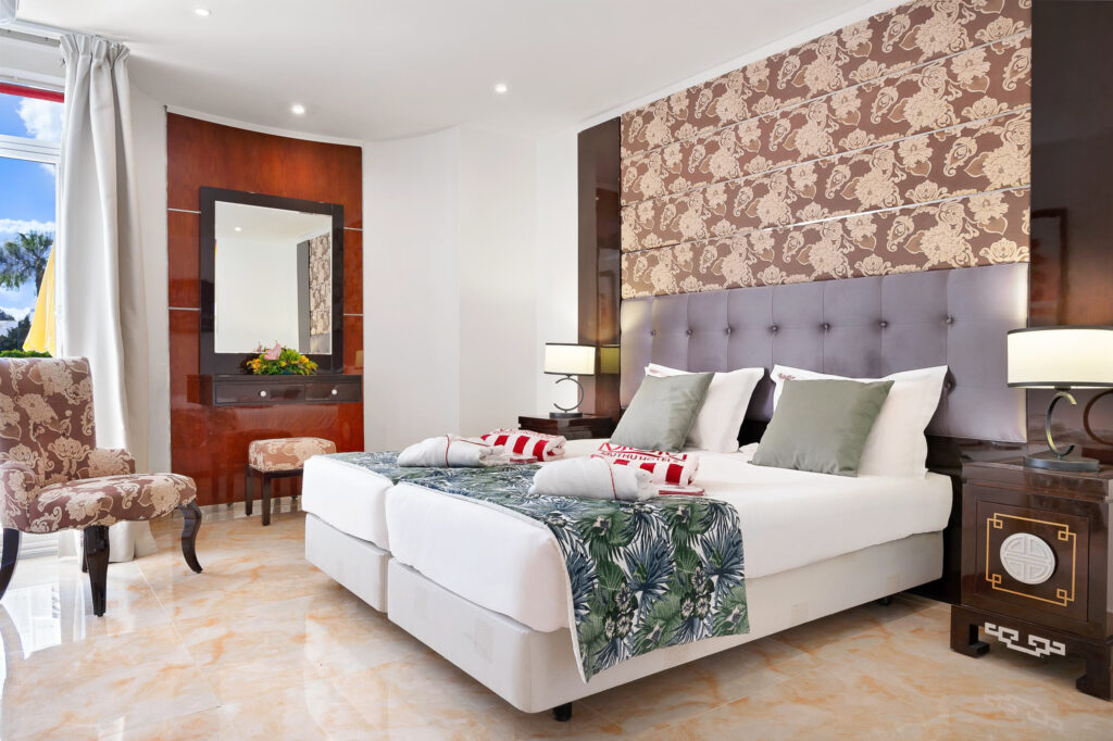 Twin bed accommodation at Muthu Clube Praia Da Oura
