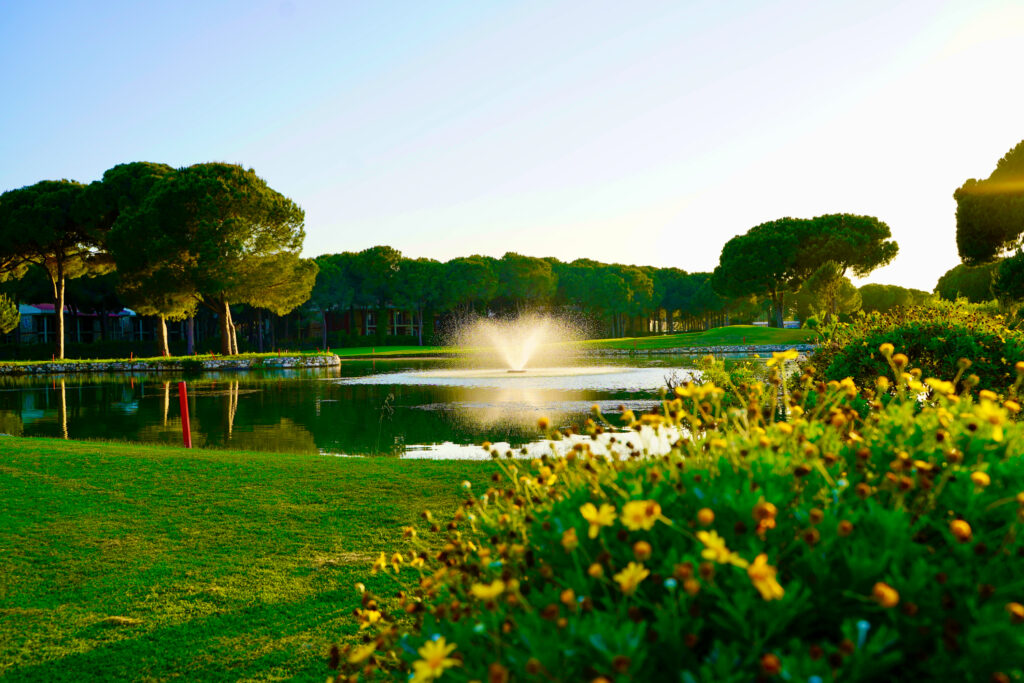 Lake with fountain with trees around at Nobilis Golf Course