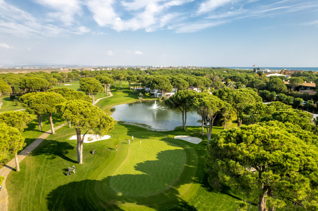 Aerial view of Nobilis Golf Course with trees and lake