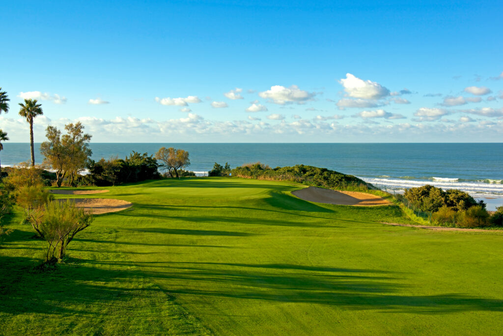 Fairway with bunkers and ocean view at Real Novo Sancti Petri Golf Club - B Course