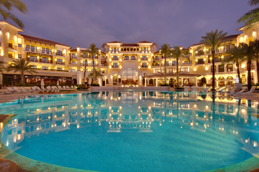 Exterior of ONA Mar Menor Golf & Spa with outdoor pool at night