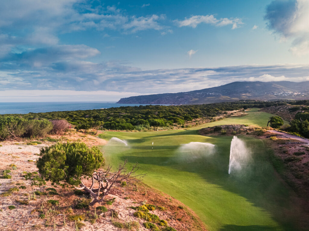 Fairway at Oitavos Dunes Golf Course with sprinklers on