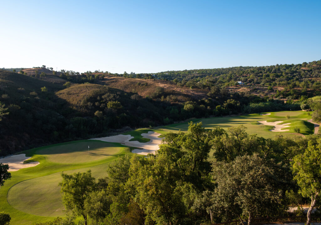 Fairway with bunkers surrounded by hills at Ombria Golf Course