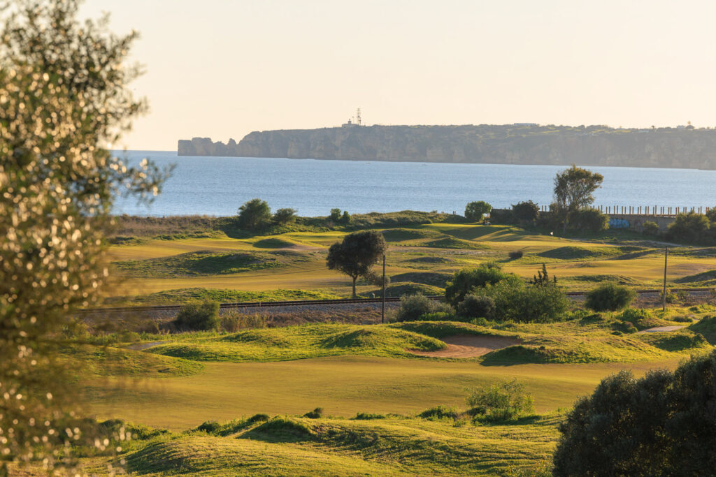 Fairway with bunkers and ocean view with cliff in background at Palmares Golf Course