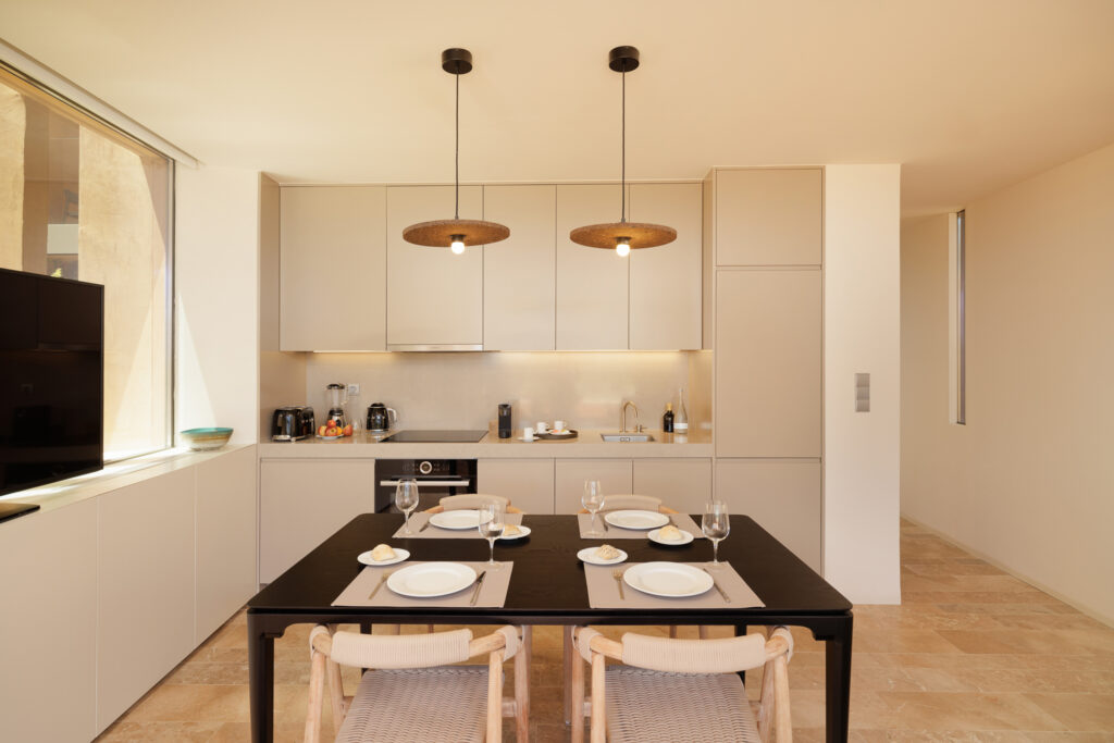Dining area in accommodation at Palmares Signature Apartments