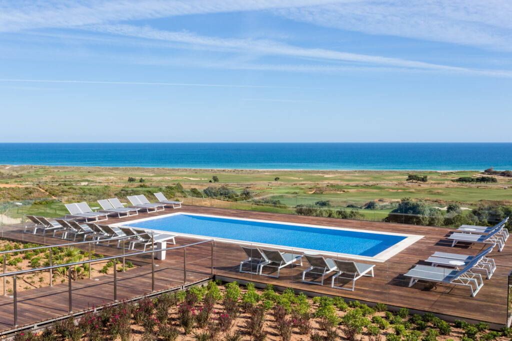 View of the outdoor pool at Palmares Beach House Hotel