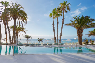 Outdoor pool at Paradisus by Melia Gran Canaria with loungers