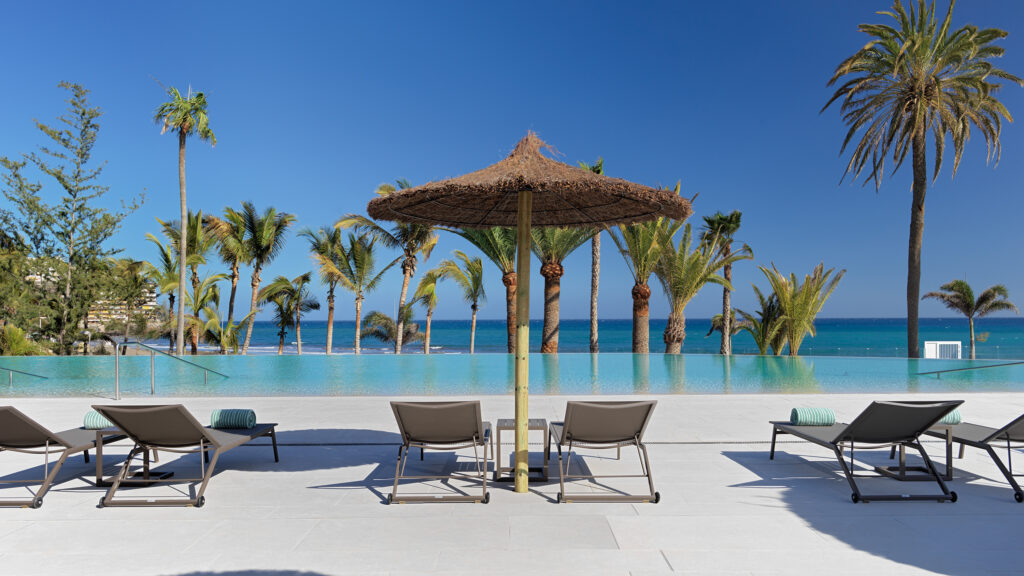 Patio with loungers at Paradisus by Melia Gran Canaria and view of the ocean