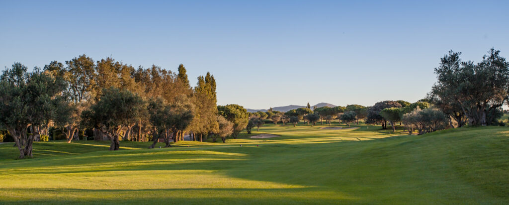 Fairway with trees around at Peralada Golf Course