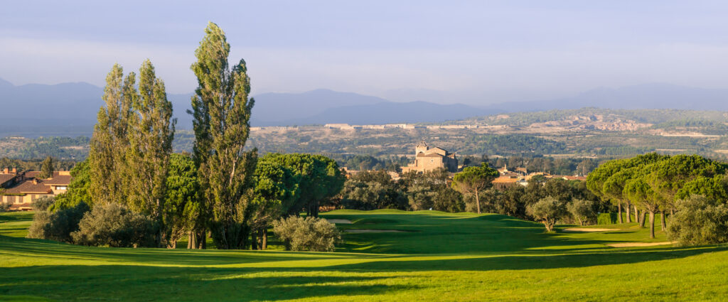 Fairway with trees around at Peralada Golf Course