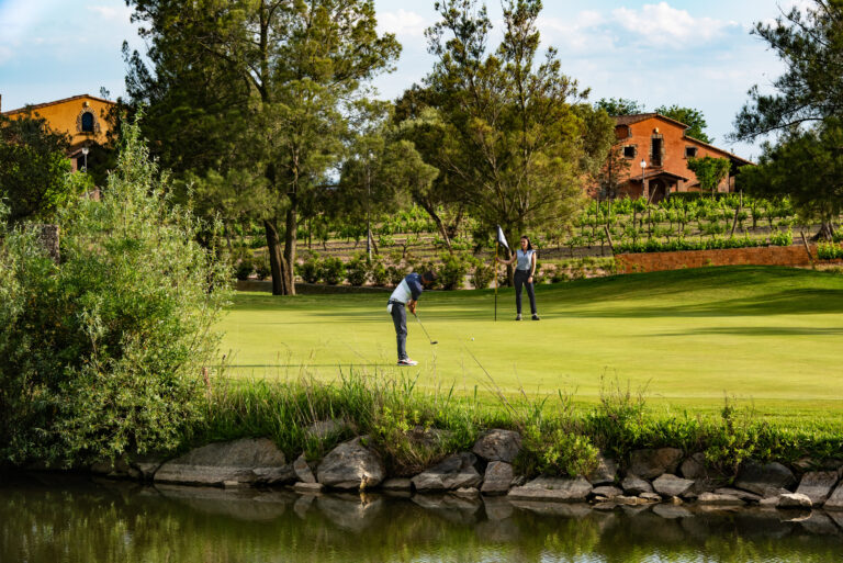 Couple playing golf at Peralada Golf Course