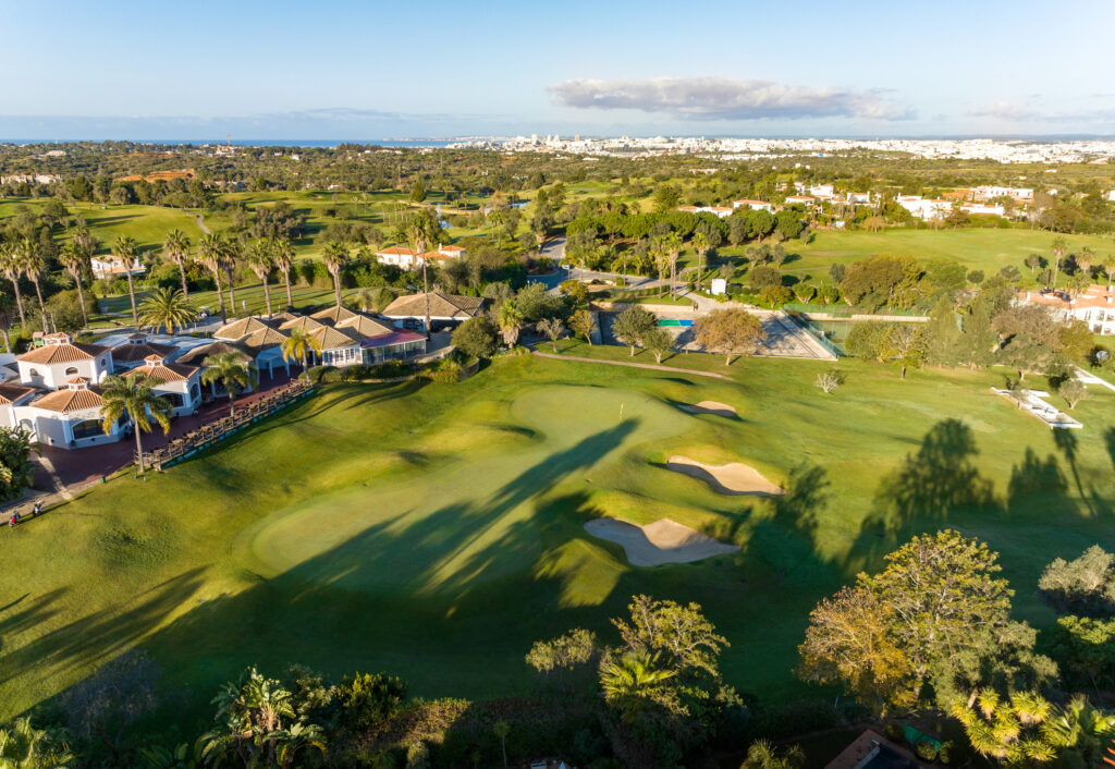 Aerial view of the fairway with buildings around at Gramacho Golf Course