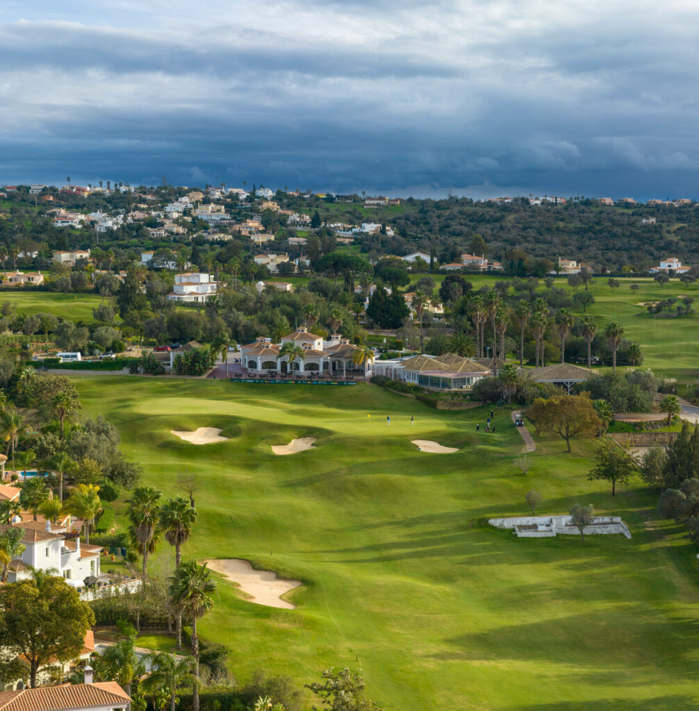 Aerial view of the fairway with bunkers and buildings around at Gramacho Golf Course