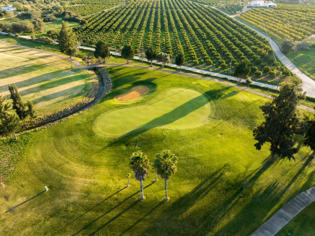 Aerial view of a green at Silves Golf Course with bunker