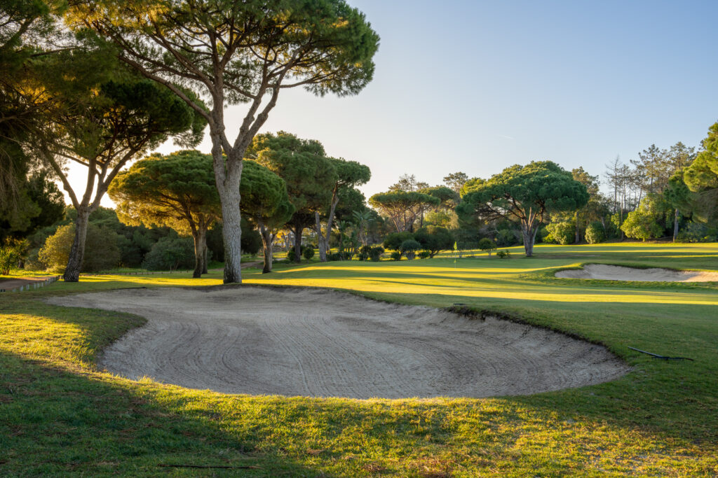 Bunkers with trees around at Vila Sol Golf Course