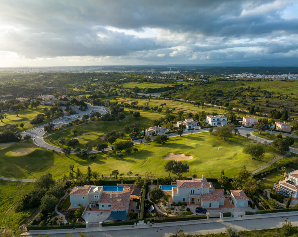 Aerial view of Pinta Golf Course with buildings around