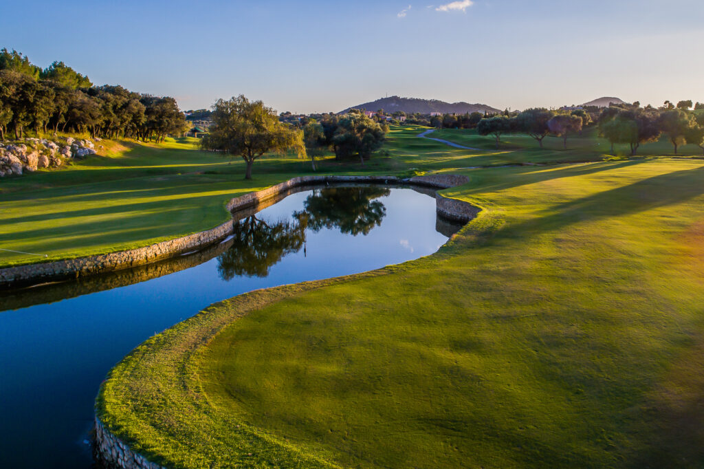 Lake on fairway with trees around at Pula Golf Club