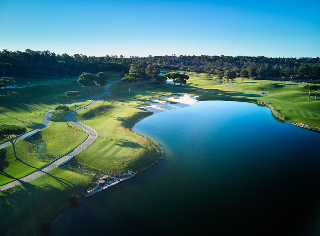 Aerial view of a lake with fairway in background at Quinta Do Lago Laranjal Golf Course