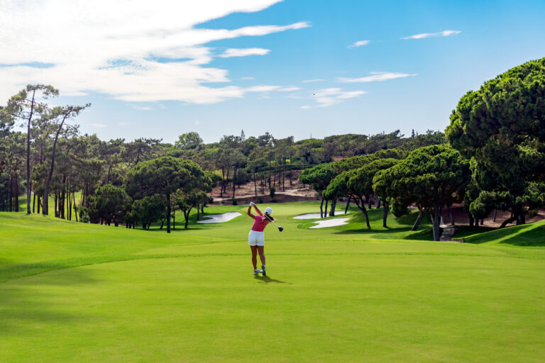 Woman playing golf at Quinta Do Lago South Golf Course