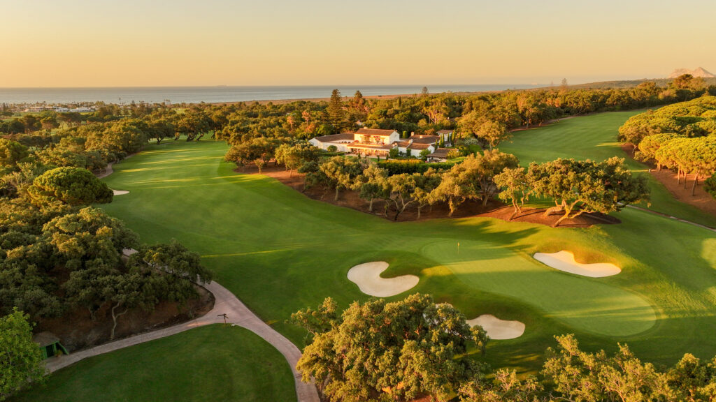 Fairway with trees and bunkers at sunset at Real Club Valderrama Golf Course