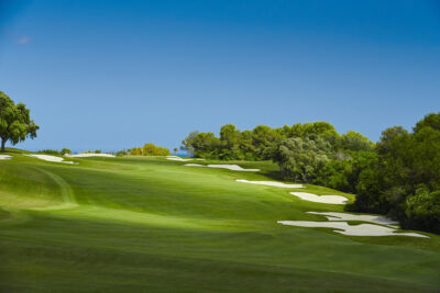 Fairway with bunkers and trees around at Real Club Valderrama Golf Course