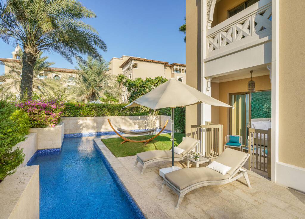 Private outdoor pool with loungers at Rixos Premium Saadiyat Island